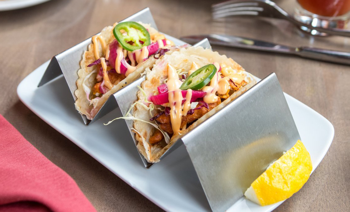 Indian fusion tacos with spicy filling and toppings